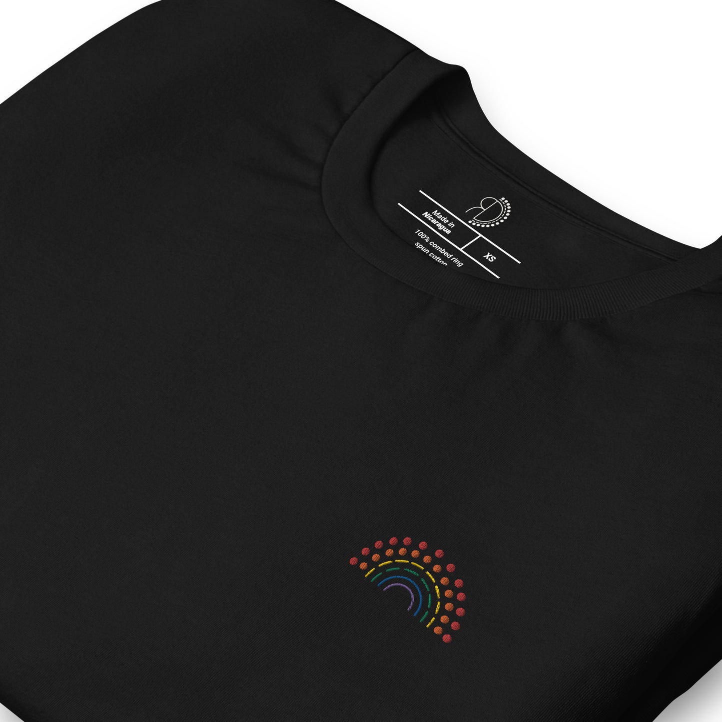 zoomed in image of black t-shirt featuring inside label with logo and product details