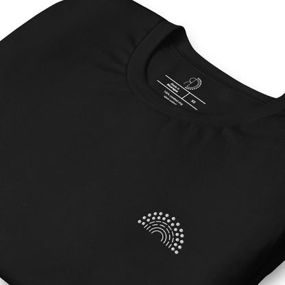 zoomed in image of black t-shirt featuring inside label with logo and product details