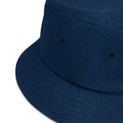 zoomed in image of dark blue denim bucket hat showing detail of fabric