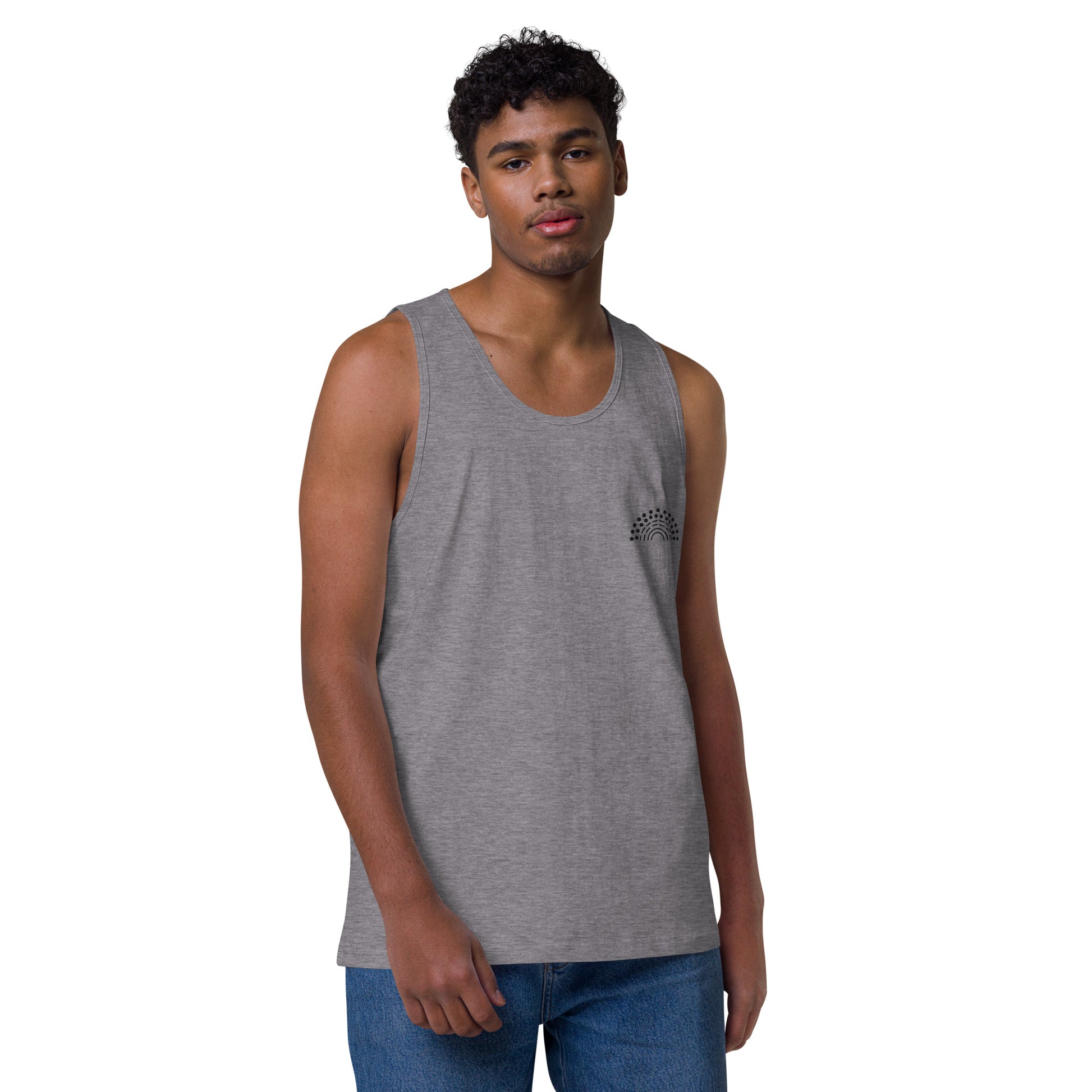 person wearing a grey athletic tank top with black pride rainbow embroidered on the left chest