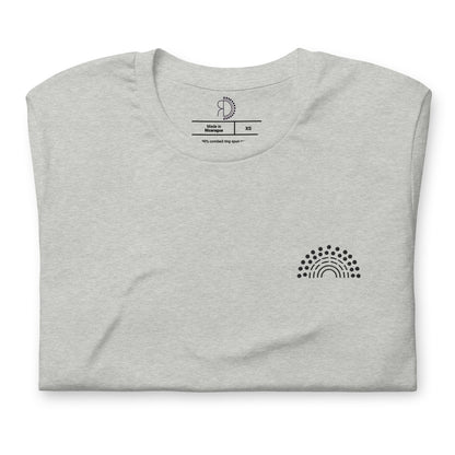 zoomed in image of grey t-shirt featuring inside label with logo and product details