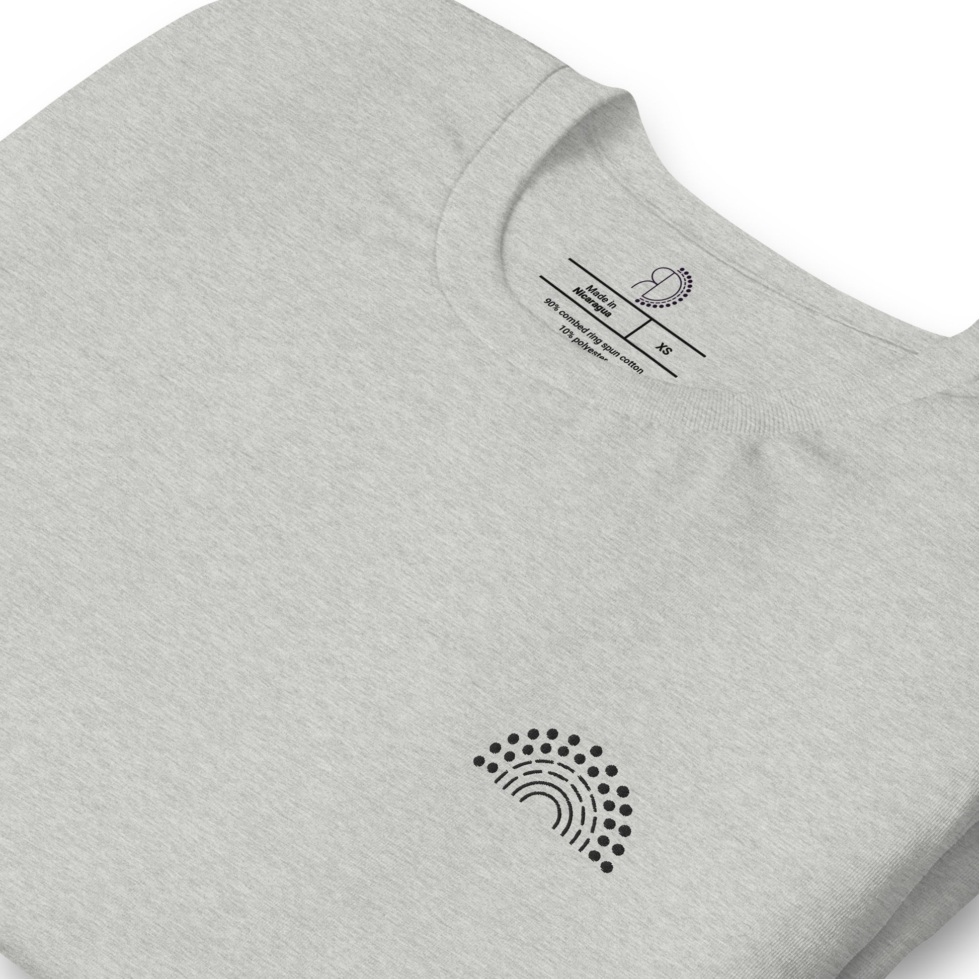 zoomed in image of grey t-shirt featuring inside label with logo and product details