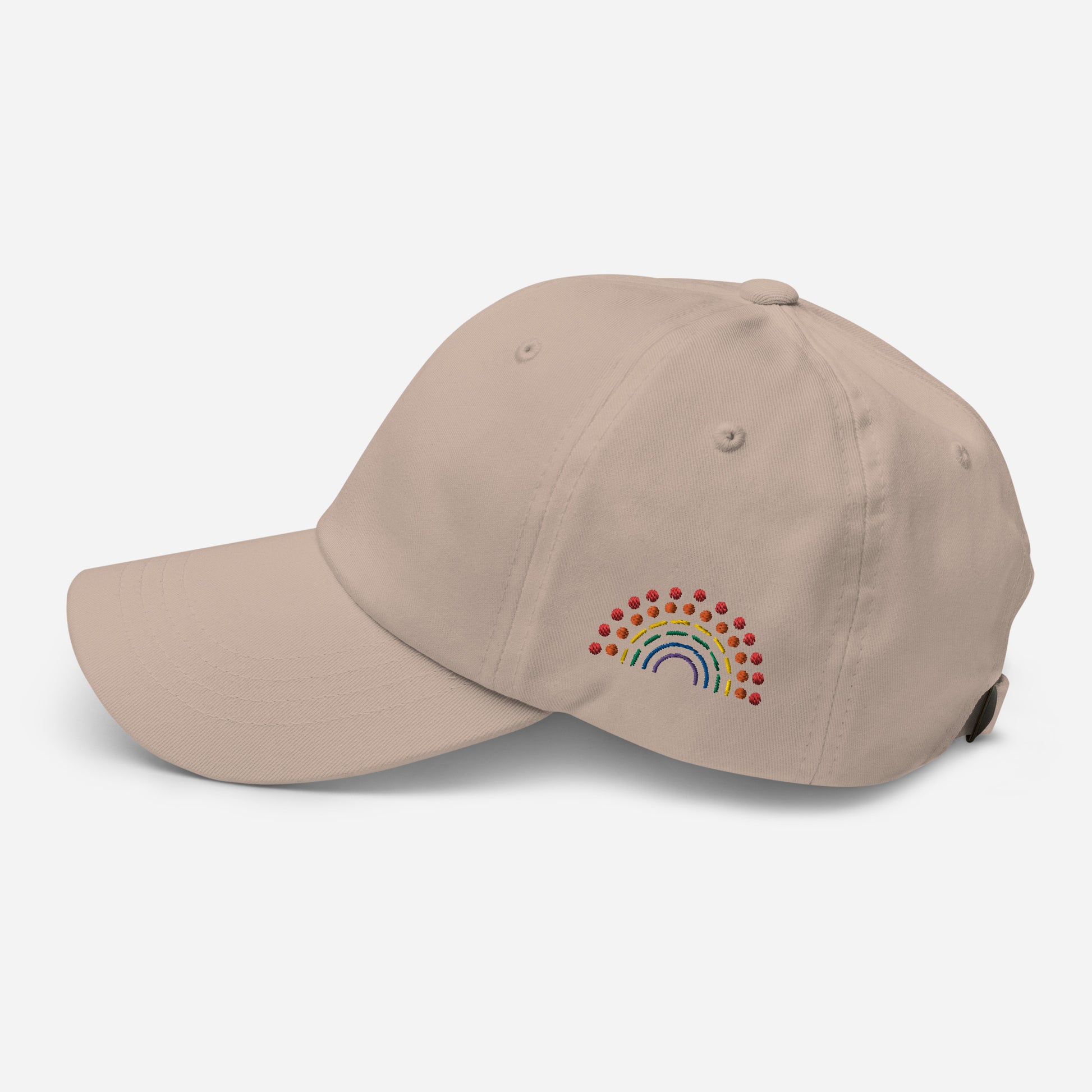 stone tan baseball dad hat with multicolored pride rainbow embroidered on the left of the hat