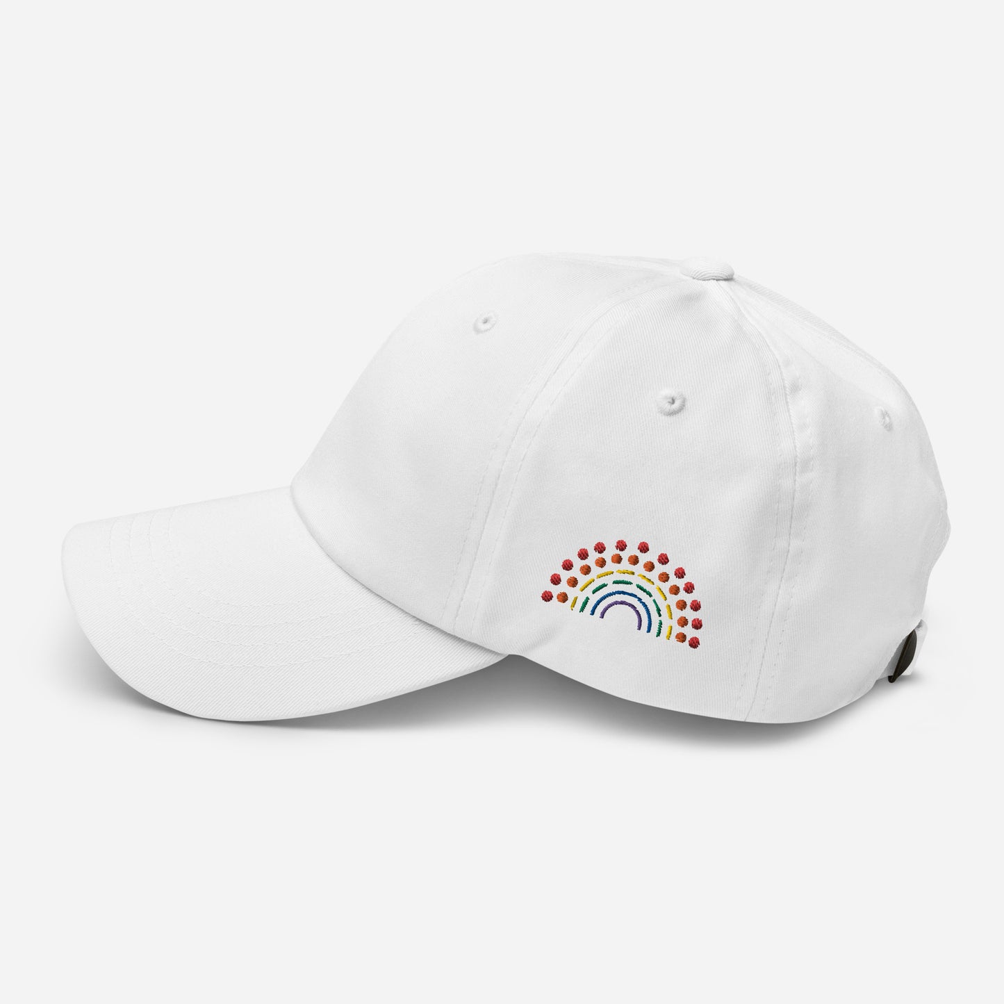 white baseball dad hat with multicolored pride rainbow embroidered on the left of the hat