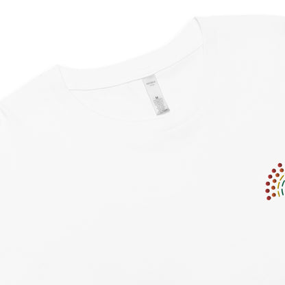 zoomed in image of white crop top featuring inside label with logo and product details