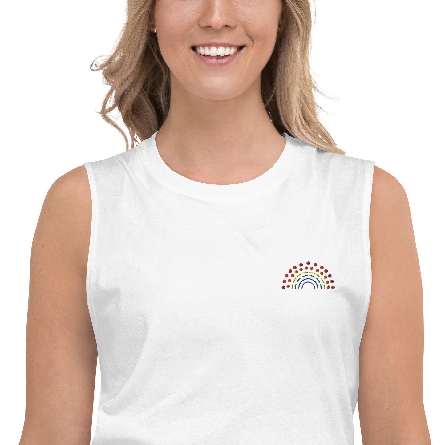 zoomed in image of person wearing a white muscle tank top with multicolored pride rainbow embroidered on the left chest