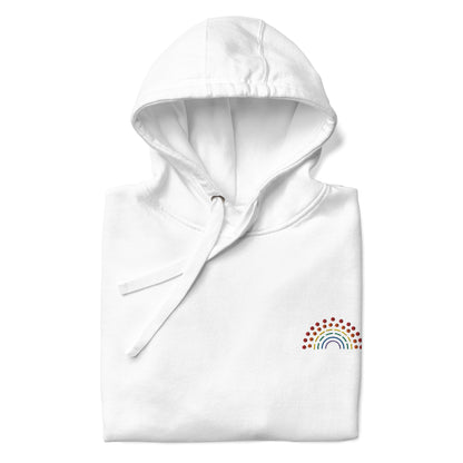 folded white hoodie sweatshirt with multicolored pride rainbow embroidered on the left chest