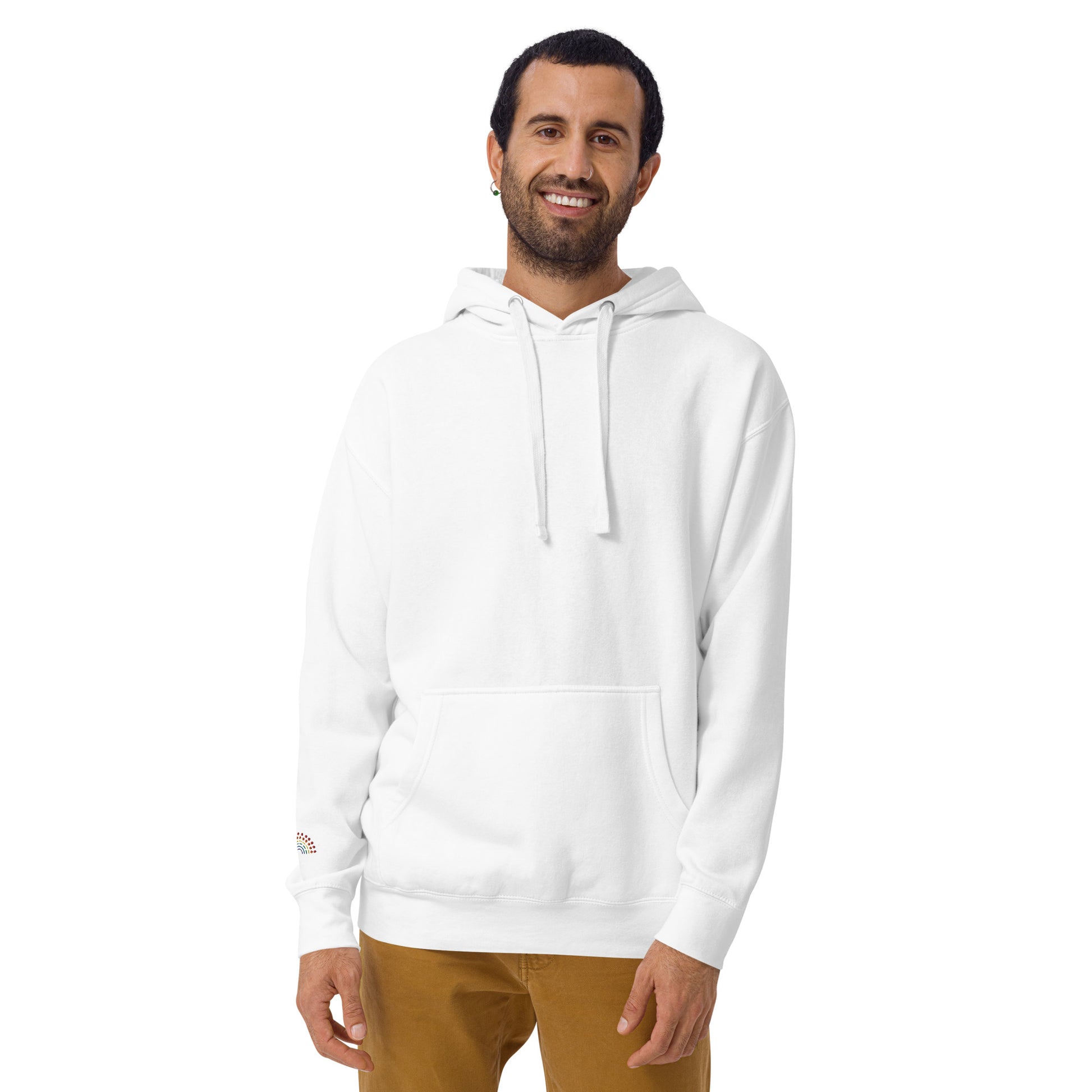 person wearing a white hoodie sweatshirt with multicolored pride rainbow embroidered on the right wrist